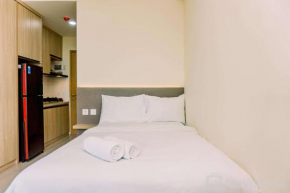 Homey and Cozy Living Studio Apartment at B Residence By Travelio